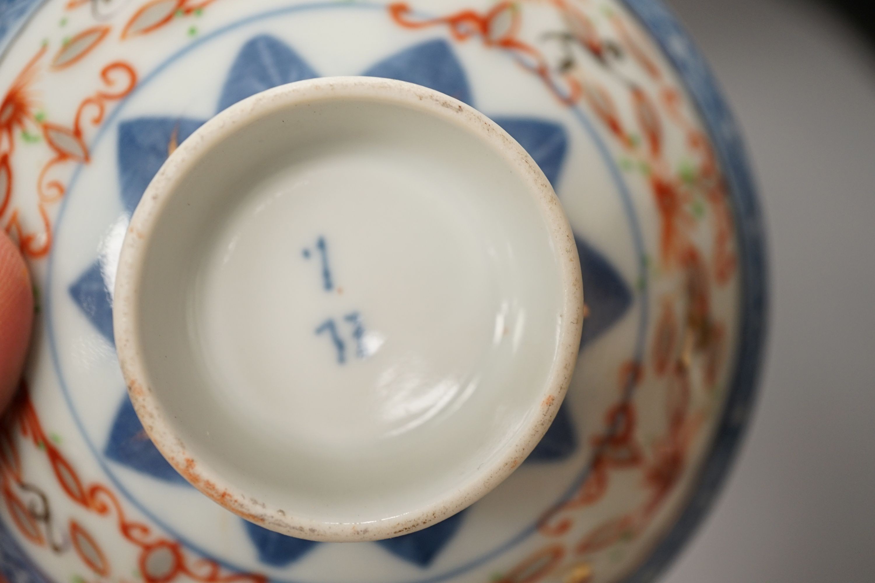 Five Chinese ceramic figures, saucers, etc., tallest 15cm. (18)
